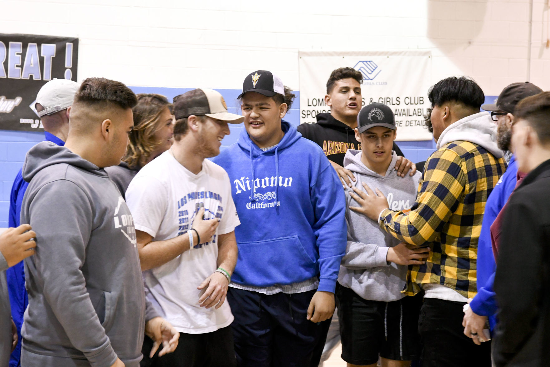 121819 Morgan and Nunez sign 03.jpg